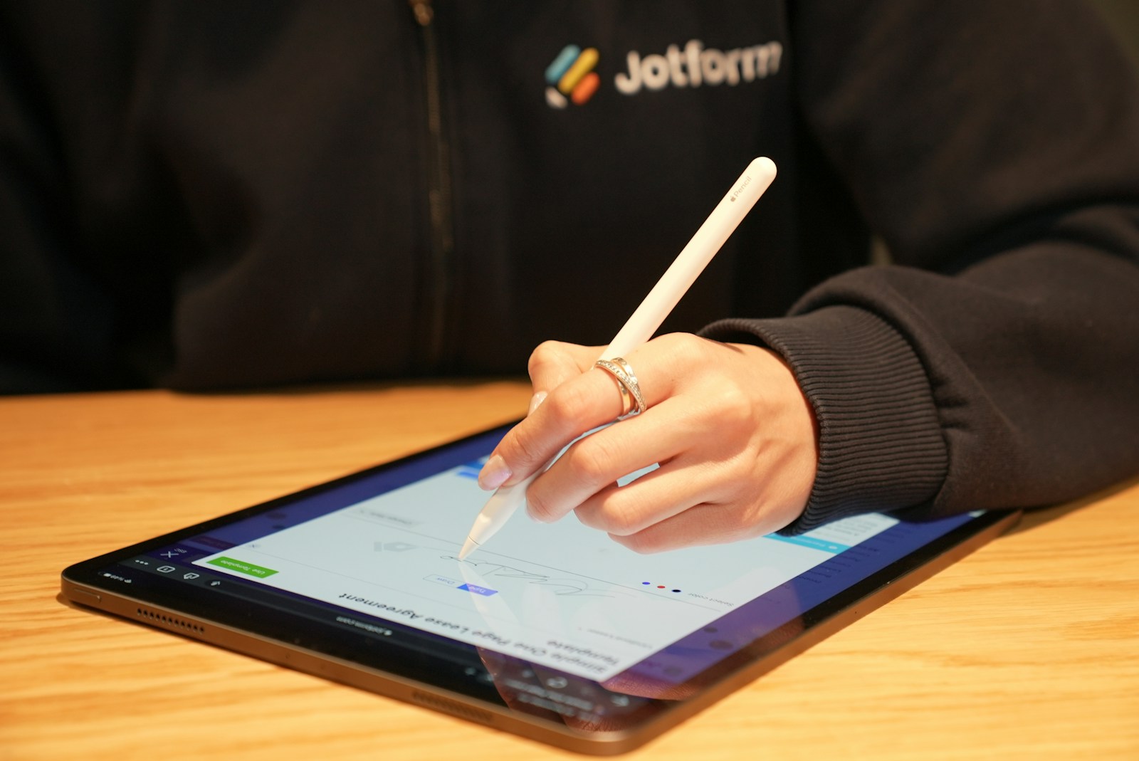 Professional signing a digital contract